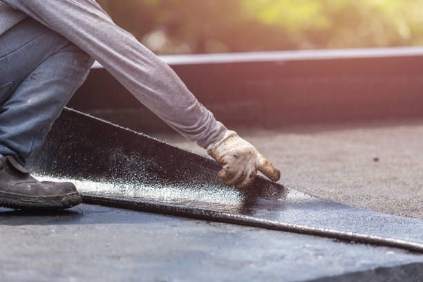 Professional Basement Waterproofing technician working in Arlington, TX